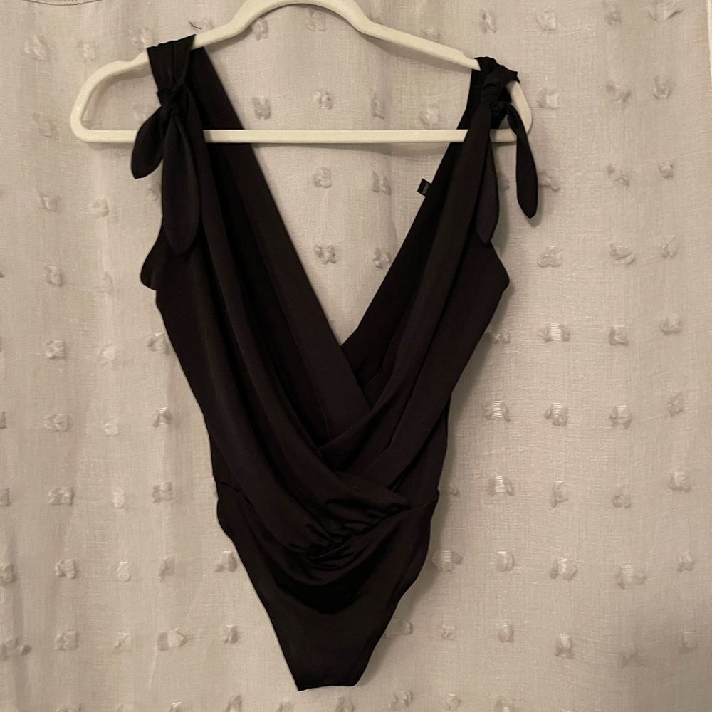 NWOT Black Express Deep V Bodysuit with Tie Straps